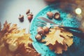 Thanksgiving. Holiday dinner table served, decorated with autumn leaves Royalty Free Stock Photo