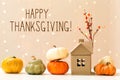 Thanksgiving message with pumpkins with a house Royalty Free Stock Photo