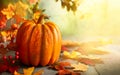 Thanksgiving orange pumpkins, autumn leaves and berries on wooden table.