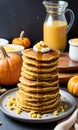 Thanksgiving Pumpkin Cornmeal Pancakes Stacked On A Plat. Generative AI