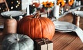 Thanksgiving, pumpkin and holiday celebration or table in a empty home dining room with decoration. Season, art and Royalty Free Stock Photo