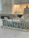 Thanksgiving table decorations with word thankful Royalty Free Stock Photo