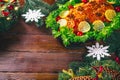 Thanksgiving table served with baked meats, decorated with bright Christmas decor and candles. Christmas dinner with roasted pork Royalty Free Stock Photo