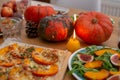 Thanksgiving table served, decorated with bright autumn leaves Royalty Free Stock Photo