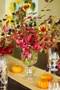 Thanksgiving table setting. Autumn table setting with small pump Royalty Free Stock Photo