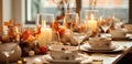 a Thanksgiving table with some pumpkins, candles and table settings Royalty Free Stock Photo