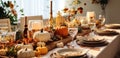 a Thanksgiving table with some pumpkins, candles and table settings Royalty Free Stock Photo