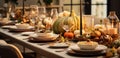 a Thanksgiving table with some pumpkins, candles and table settings Royalty Free Stock Photo