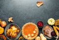 Thanksgiving traditional food for festive charity or family and friends dinner party, top-down view Royalty Free Stock Photo