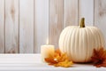 Thanksgiving White Pumpkin And Candle Decorations On White Painted Wood Table, Embodying The Spirit Of Halloween And Thanksgiving