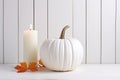 Thanksgiving White Pumpkin And Candle Decorations On White Painted Wood Table, Embodying The Spirit Of Halloween And Thanksgiving