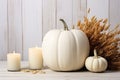 Thanksgiving White Pumpkin And Candle Decorations On White Painted Wood Table, Embodying The Spirit Of Halloween And Thanksgiving