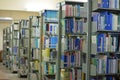 Old bookshelf with books arranged neatly in a wide variety of large libraries..