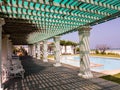 A covered poolside walkway in a heritage building in the former Danish trading Royalty Free Stock Photo