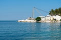 Thassos white marble (dolomite) quarry, Saliara Beach, the Aegean sea, Greece. Global stone industry Royalty Free Stock Photo