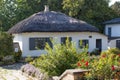 Thatch roof cottage in the picturesque village Royalty Free Stock Photo