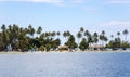 Thatched bungalows and tents on a small island