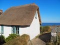 A thatched cottage in Cadgwith in Cornwall, Southwest England