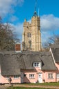 Thatched cottage painted in Suffolk pink