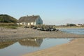 Thatched Cottage by the Sea Royalty Free Stock Photo