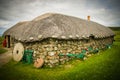 A thatched cottage at the Skye Museum of Island Life on Isle of Skye in Scotland Royalty Free Stock Photo