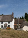 Thatched cottages at Lustleigh village in the Wrey Valley on Dartmoor National Park in Devon