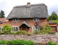 Thatched English Village Cottage and garden Royalty Free Stock Photo