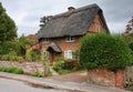 Thatched English Village Cottage and garden Royalty Free Stock Photo