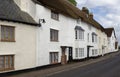 Thatched Harbourside cottages Royalty Free Stock Photo
