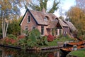 Thatched house and boats