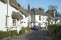 Thatched house and village inn in rural South Devon England UK