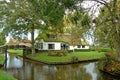 Thatched house on waterside