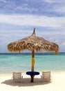 Thatched hut on a stretch of beach in Aruba Royalty Free Stock Photo