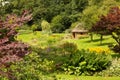 Thatched summer house in beautiful English garden. July 19th 2020 - Diss, Norfolk, UK Royalty Free Stock Photo