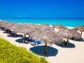 Thatched umbrellas at a beach in Cuba Royalty Free Stock Photo