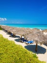 Thatched umbrellas at a beach in Cuba Royalty Free Stock Photo