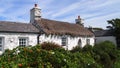 A thatched cottage in the village of Cregneash on the Isle of Man in the Irish Sea