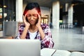 Thats enough studying, time for a break. a young female student experiencing a headache outside on campus. Royalty Free Stock Photo