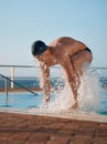 Thats enough for today. a handsome young male athlete swimming in an olympic-sized pool. Royalty Free Stock Photo