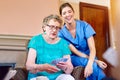 Thats a great hand. seniors playing cards in their retirement home. Royalty Free Stock Photo