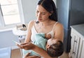 Thats not good at all. a mother taking her babys temperature at home. Royalty Free Stock Photo