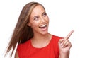 Thats where it should go. an attractive young woman pointing away. Royalty Free Stock Photo