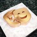 Theater Masks icon. Bronze Theater Masks symbol on white marble podium Royalty Free Stock Photo