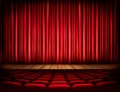 A theater stage with a red curtain, seats. Royalty Free Stock Photo