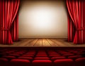 A theater stage with a red curtain, seats.