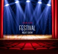 A theater stage with a red curtain and a spotlight Royalty Free Stock Photo