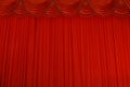 Theater stage red curtains or cinema drapes. Royalty Free Stock Photo