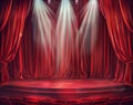 Theater Stage With Red Curtains and Red Seats Royalty Free Stock Photo