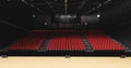 Theatre with empty stage in spotlight. Red theater curtain and seats Royalty Free Stock Photo