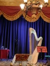 Theatre harp music performance blue velvet